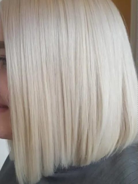 After: a sleek ice-blonde bob by Homeward Halo hair salon in Radcliffe, Bury