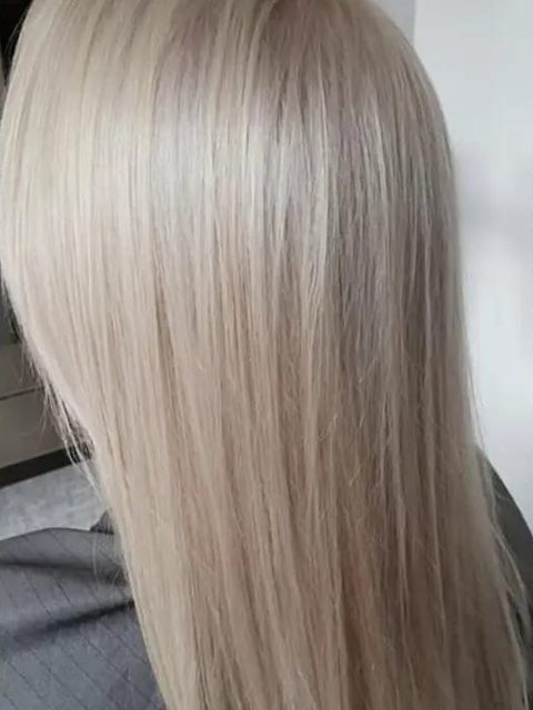 After: long, smooth cool blonde by Homeward Halo hair salon in Radcliffe, Bury