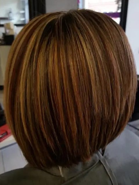After: a sleek bob with warm highlights by Homeward Halo hair salon in Radcliffe, Bury